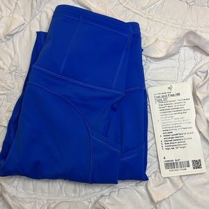 Lululemon fast and free hr tight 25’’ size 4 BLAZER BLUE TONE
